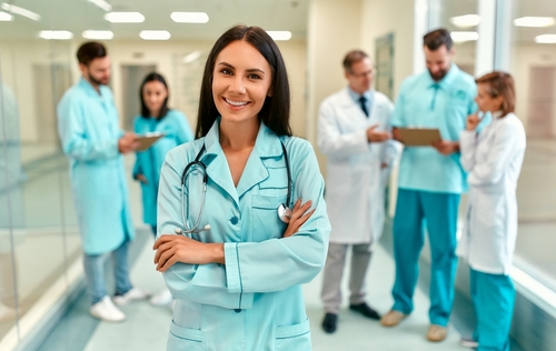 a,confident,female,healthcare,professional,stands,strong,with,a,diverse