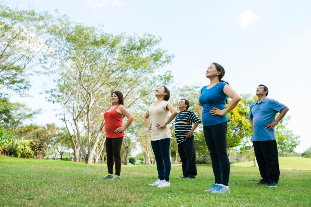 group,of,elderly,people,doing,breathing,exercise